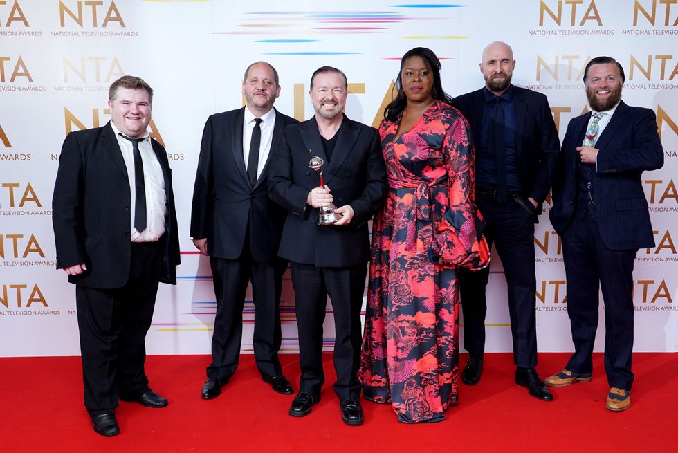 09/09/21 PA File Photo of Ricky Gervais (centre) and the cast and crew of After Life in the press room after winning the Comedy award at the National Television Awards 2021 held at the O2 Arena, London. See PA Feature SHOWBIZ TV After Life. Picture credit should read: Ian West/PA Photos. WARNING: This picture must only be used to accompany PA Feature SHOWBIZ TV After Life.