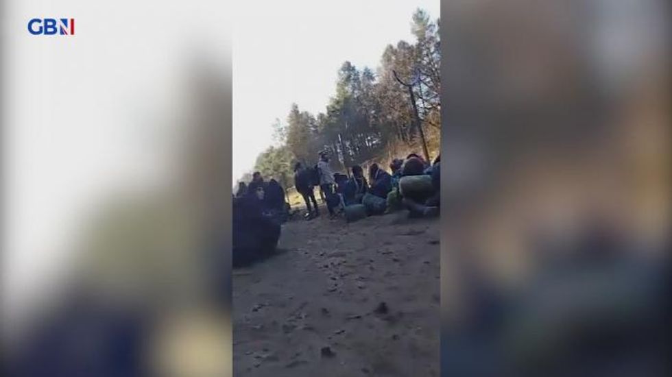 Poland fears over migrants as shots reportedly fired at Belarus border