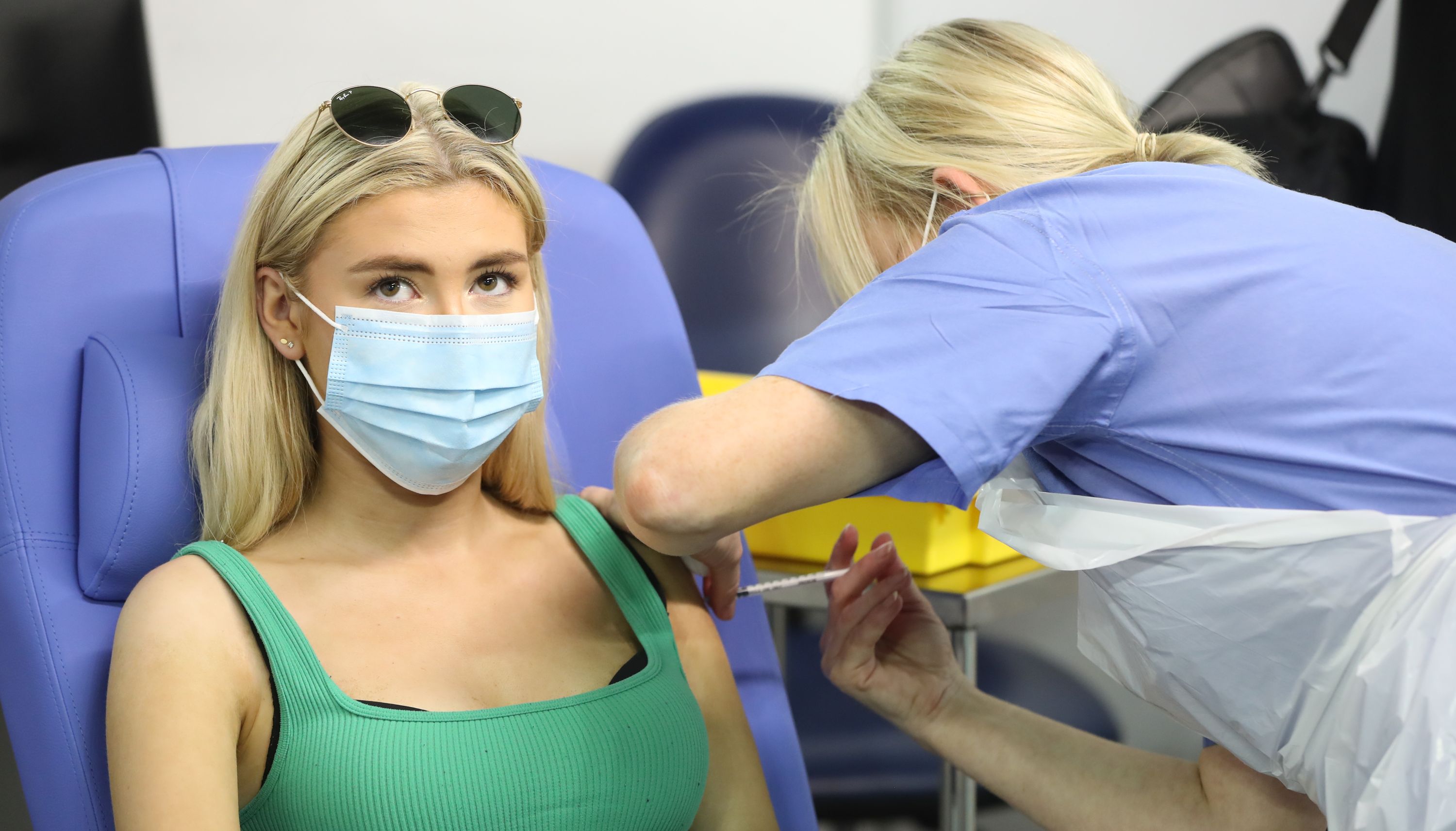 17-year-old Danielle McIlroy, from Bangor, is given the last vaccination of the day during the The Big Jab Weekend at the vaccine clinic at the SSE Arena, Belfast.