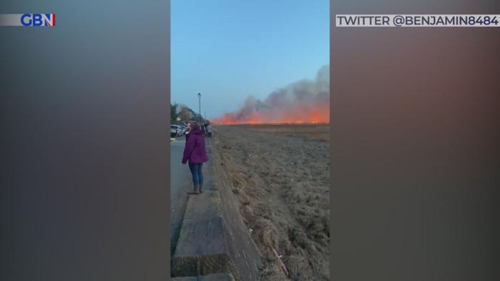 Fire crews tackle blaze on Parkgate marshland on the Wirral