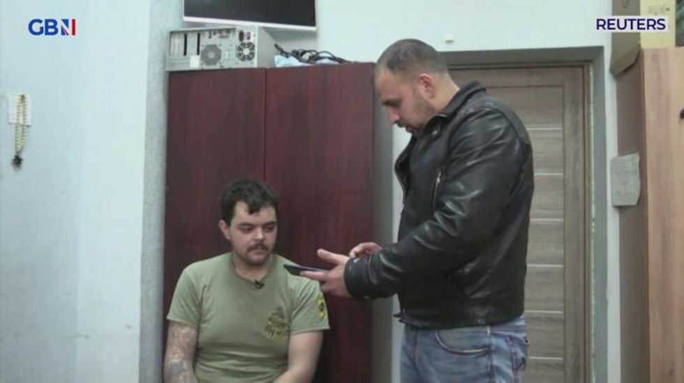 Russian propaganda video shows the two captured Brits beg Boris Johnson to exchange them for Putin ally