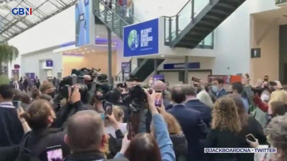 Leonardo DiCaprio makes appearance at Cop26, after commercial flight to Scotland