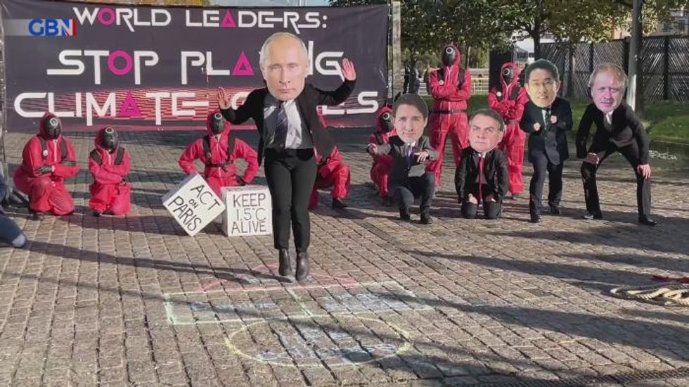Cop26: Climate activists stage protest posed as world leaders in Squid Game
