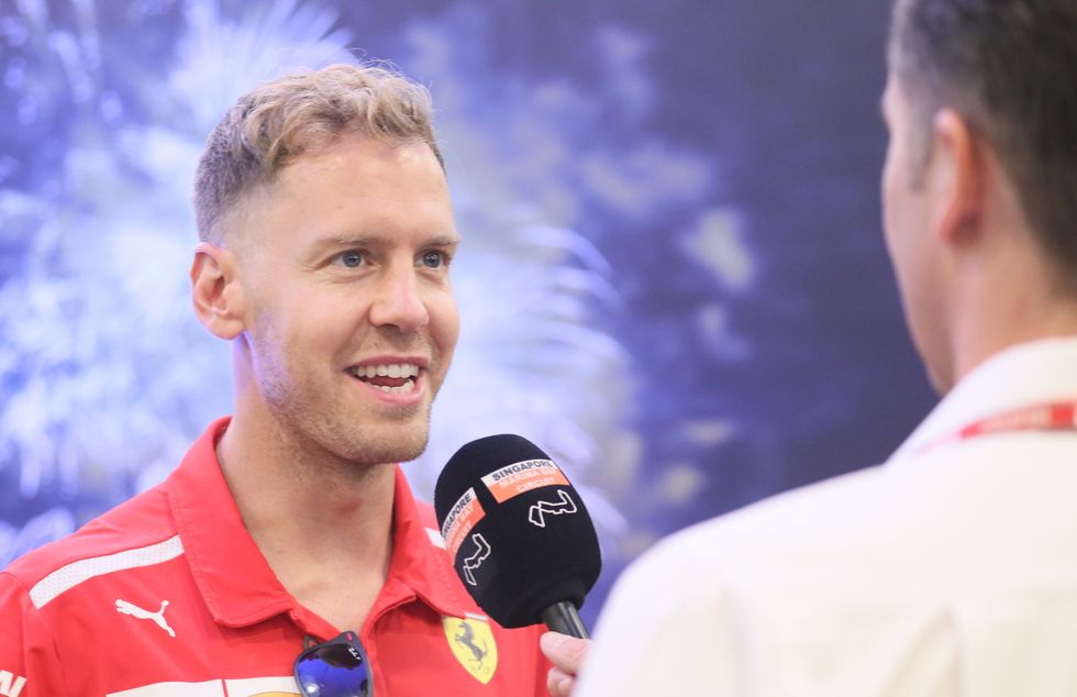 2018 FORMULA 1 SINGAPORE AIRLINES SINGAPORE GRAND PRIX (13 September 2018) - Zone 1 - Paddock Club - Drivers' Autograph Session Ferrari's Sebastian Vettel Singapore Grand Prix via Reuters Plus