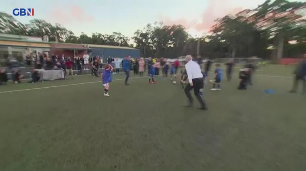 Australian PM Scott Morrison flattens eight-year-old child in football match
