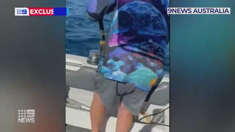 Great white shark attacks family's fishing boat in terrifying footage