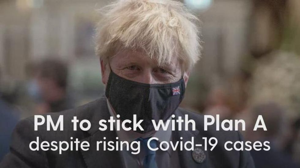 Boris Johnson refuses to commit to wearing a face mask in Parliament