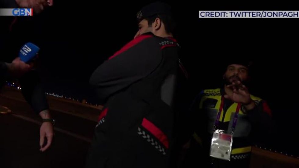 'Take it off!' World Cup TV reporter confronted live on air by Qatari police for wearing LGBT armband