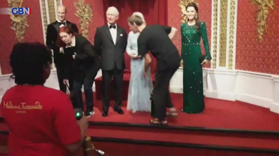 Just Stop Oil protesters cover King Charles III waxwork model with chocolate cake at Madame Tussauds