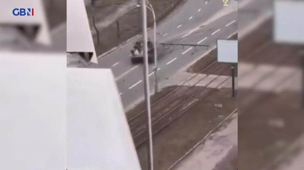 Tank drives over man's car in Ukraine... And he lives to tell the tale – WATCH