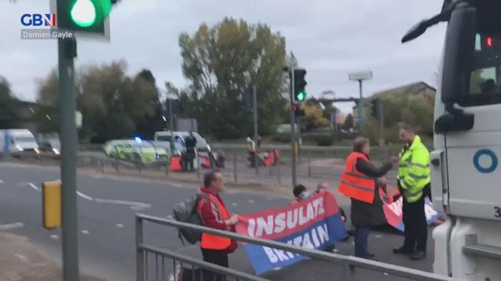 Insulate Britain: Protester glues himself to a road near M25 ahead of Rishi Sunak’s budget