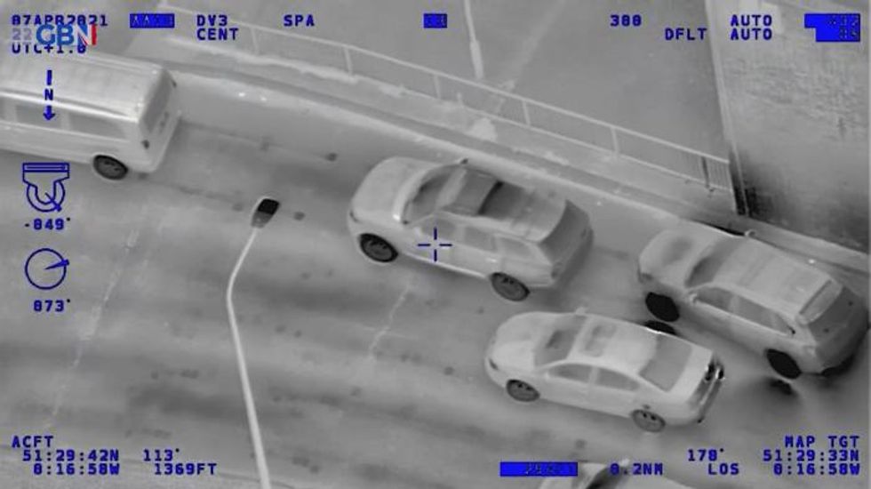 Jury sees footage of millionaire murder accused leading police on 135mph chase