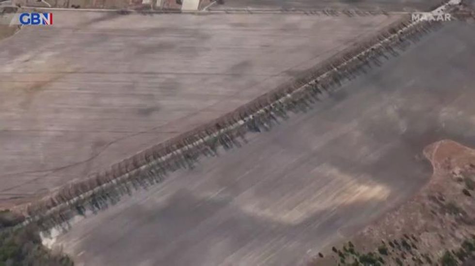 Putin's huge 40-mile convoy of heavy armour laid bare in astonishing video as troops near Kyiv