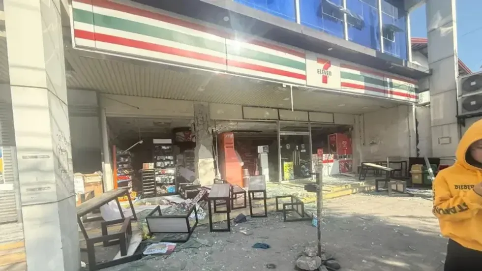 7-Eleven gas station shattered windows as a result of Philippine earthquake