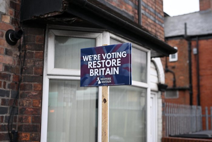 A banner for the Restore Britain political party is picured in Ashton-in-Makerfield