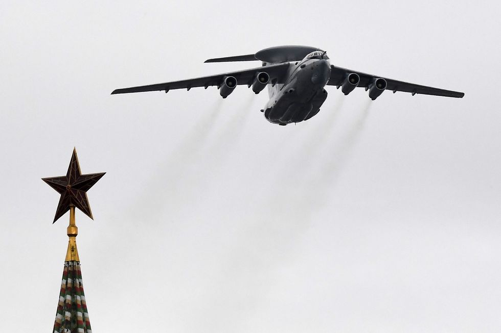A Beriev A-50 early warning and control aircraft flies over the Kremlin and Red Square