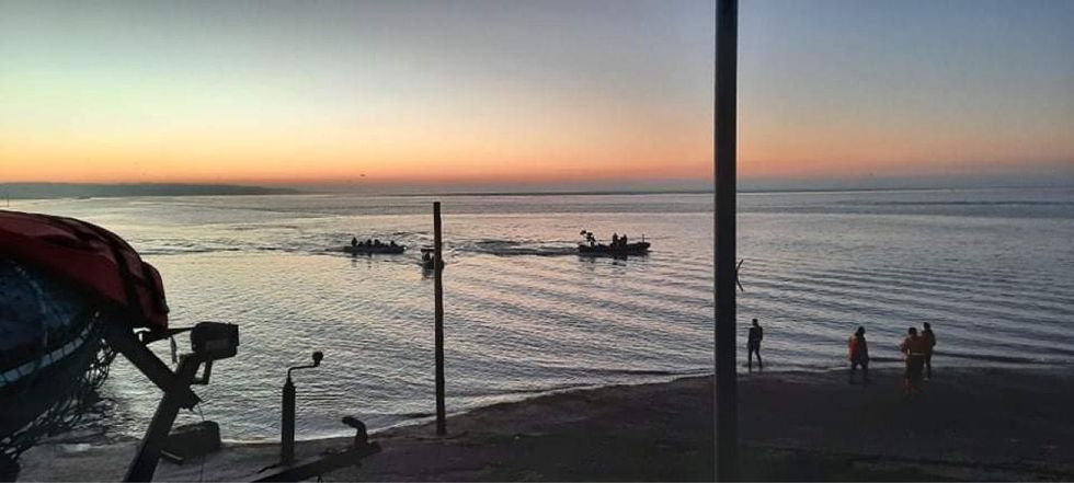A boat is towed back to Boulogne