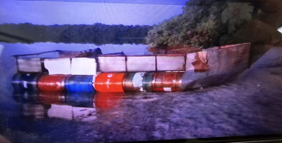 A boat with barrels attached
