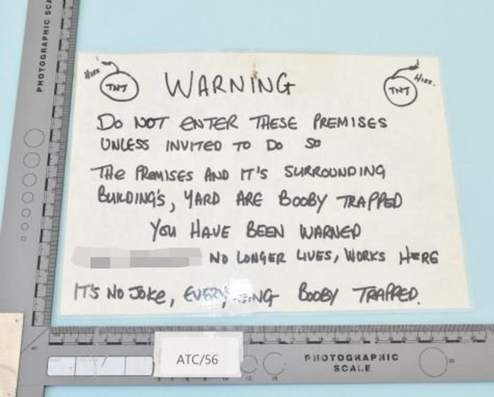 A booby trap sign found in Ian Claughton's property