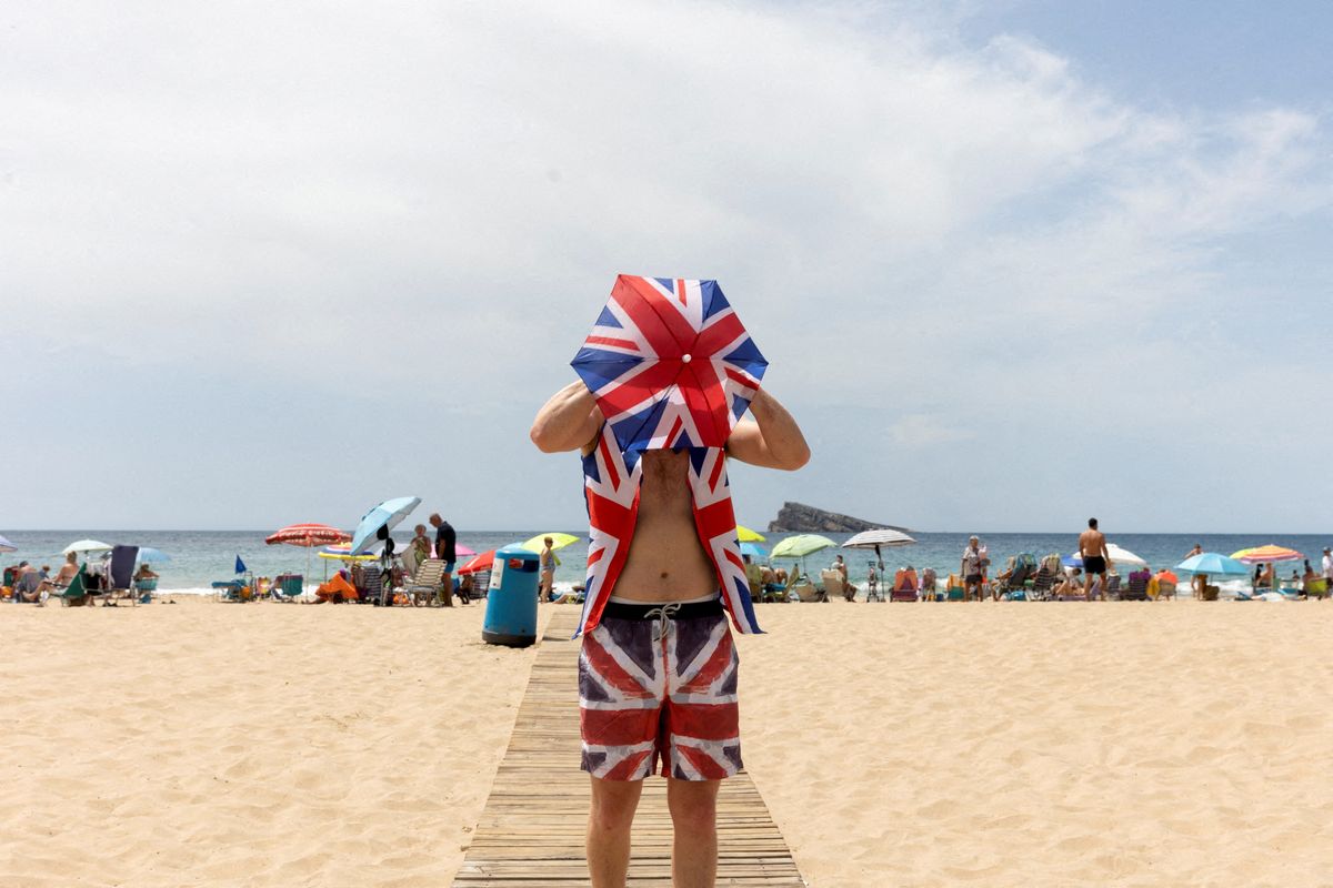 A Briton on the beach in Benidorm