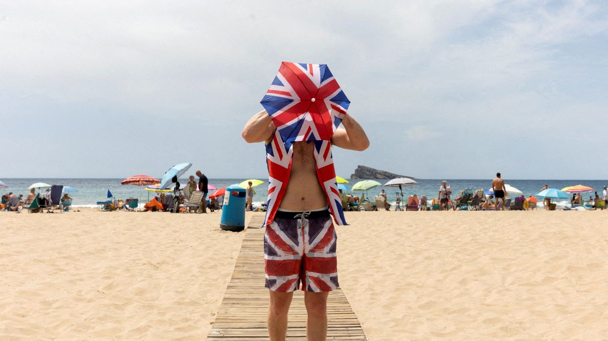 A Briton on the beach in Benidorm