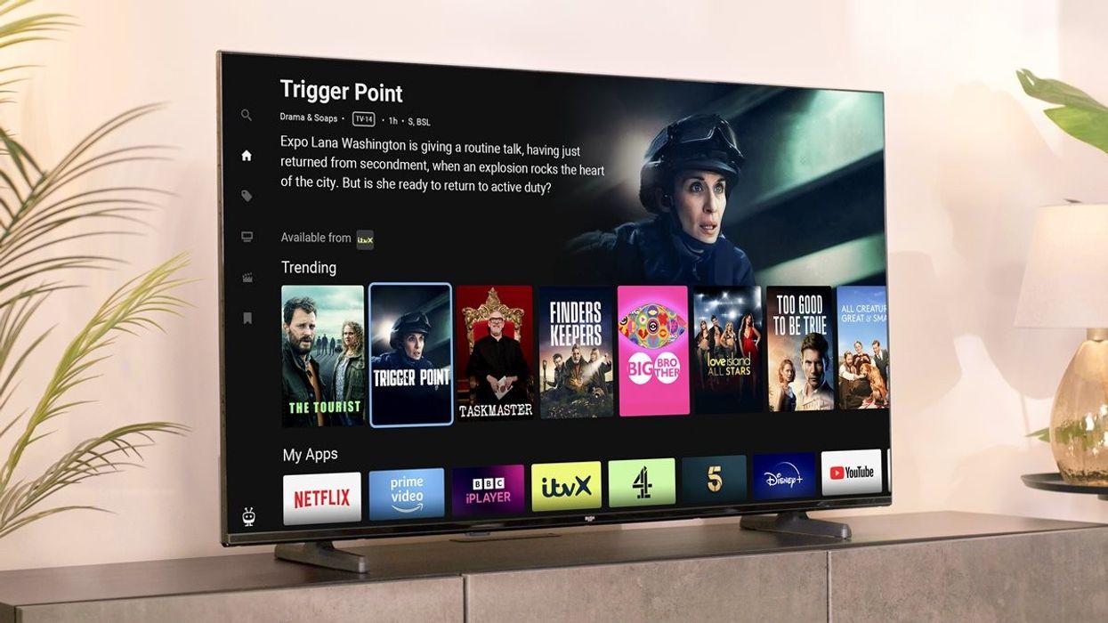 a bush tv running freely pictured on a sideboard with ITV trigger point showing on-screen