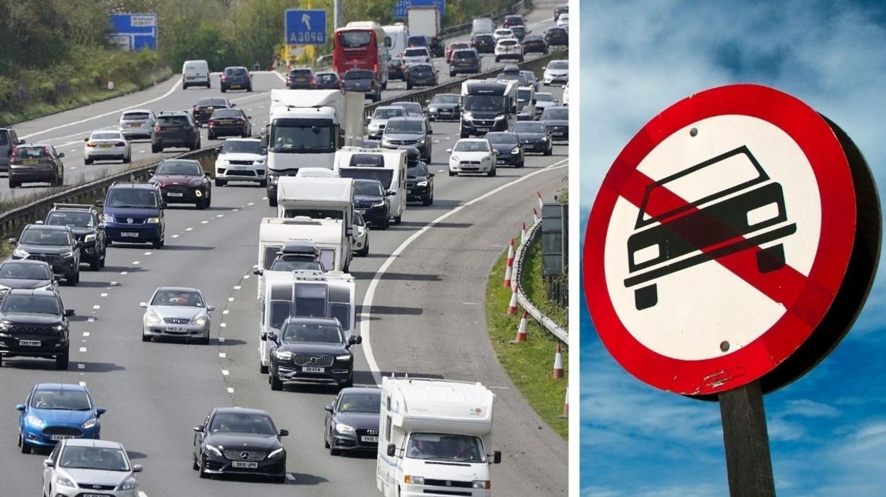 A busy motorway and a no cars allowed sign
