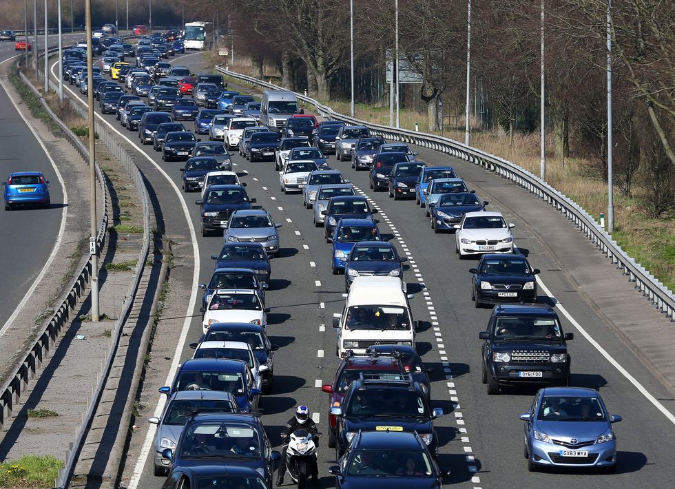 A busy motorway in the summer