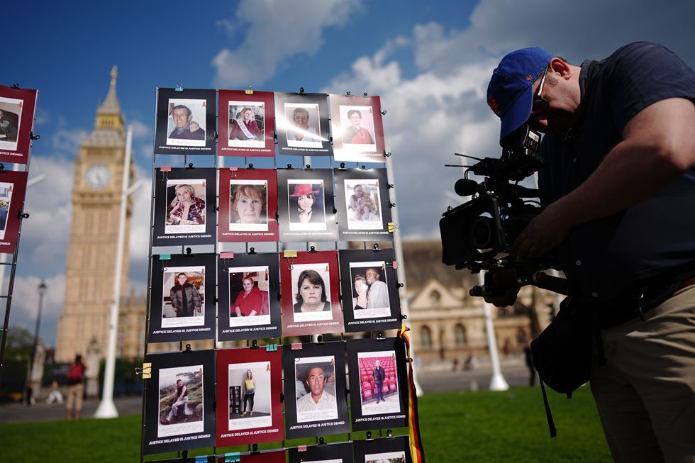 A camera operator films portraits of people who have died or been affected by the infected blood scandal