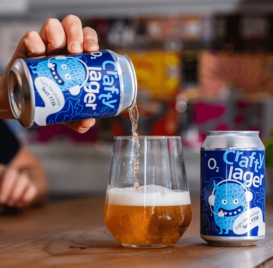 a can of Virgin Media O2's Crafty Lager 7726 being poured into a glass on a bar