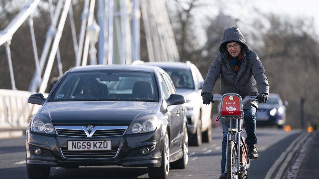 A car and bike on a road