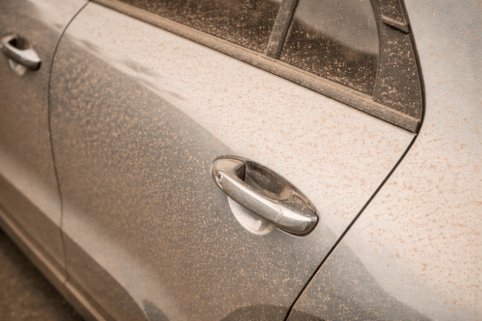 A car covered in Saharan dust