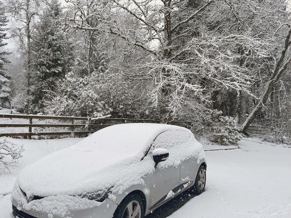 A car covered in snow near Huntly, Aberdeenshire, as Storm Eunice sweeps across the UK after hitting the south coast earlier on Friday. With attractions closing, travel disruption and a major incident declared in some areas, people have been urged to stay indoors. Picture date: Friday February 18, 2022.
