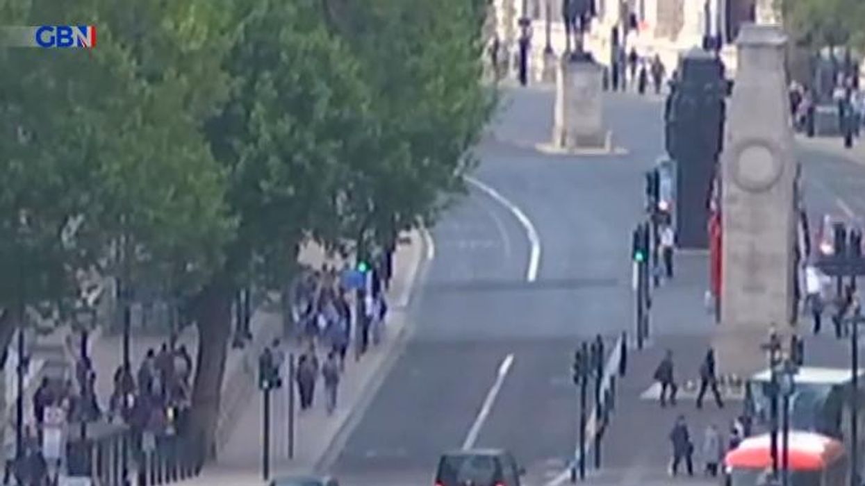 Three hospitalised after car ploughs over pavement and into building in central London