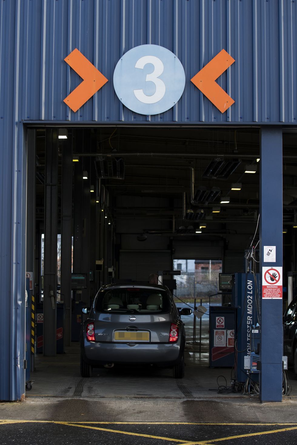 A car undergoing an MOT test.