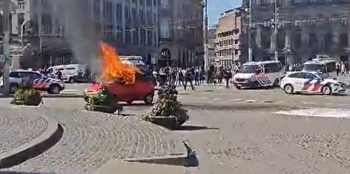 NextImg:Amsterdam car explosion: Vehicle explodes before catching on fire as man walks around engulfed in flames