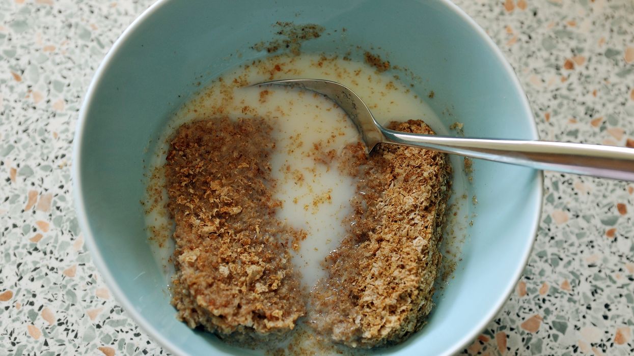 A cereal bowl containing Weetabix breakfast cereal.