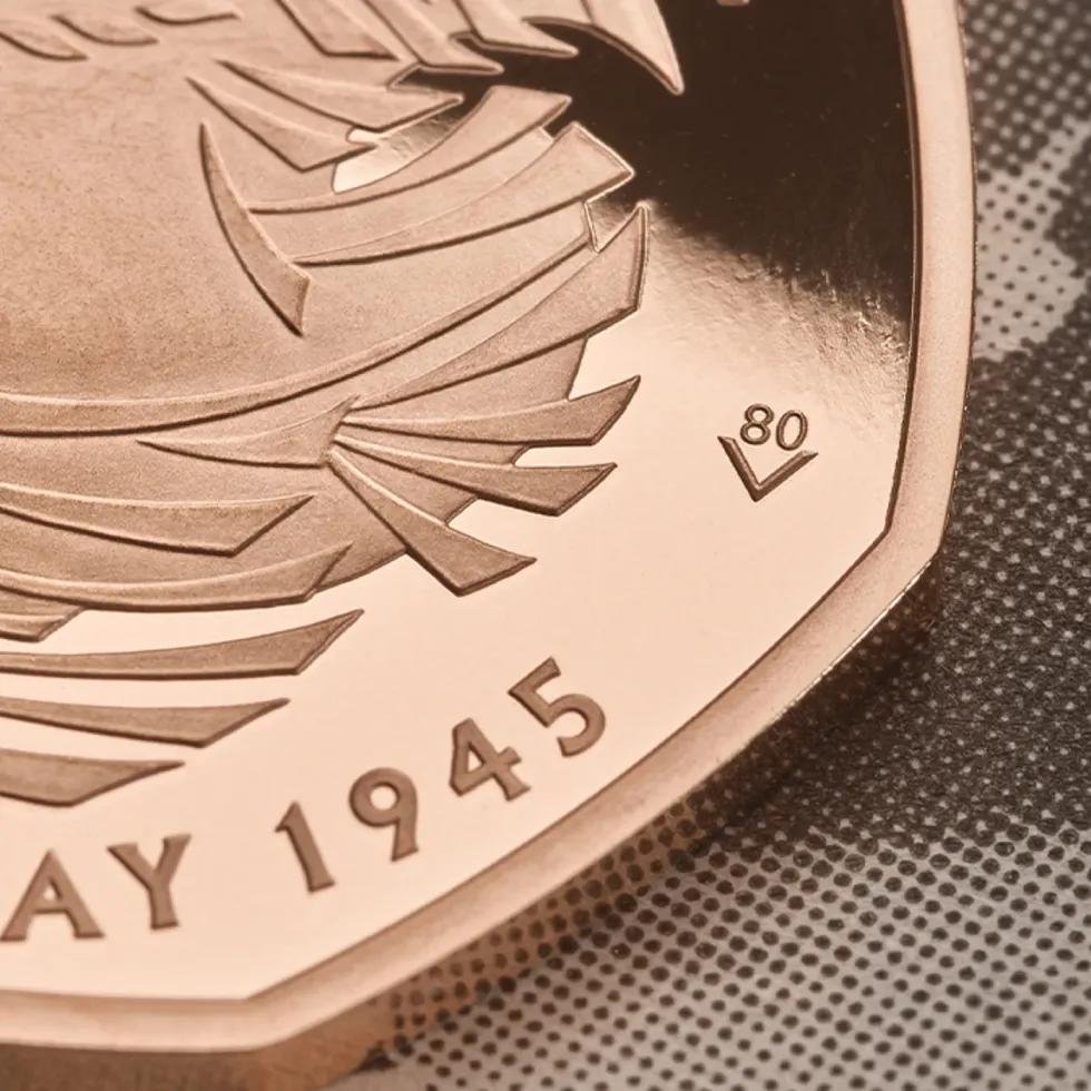a close-up shot of the 80 privy mark on the new 2025 coin from Royal Mint