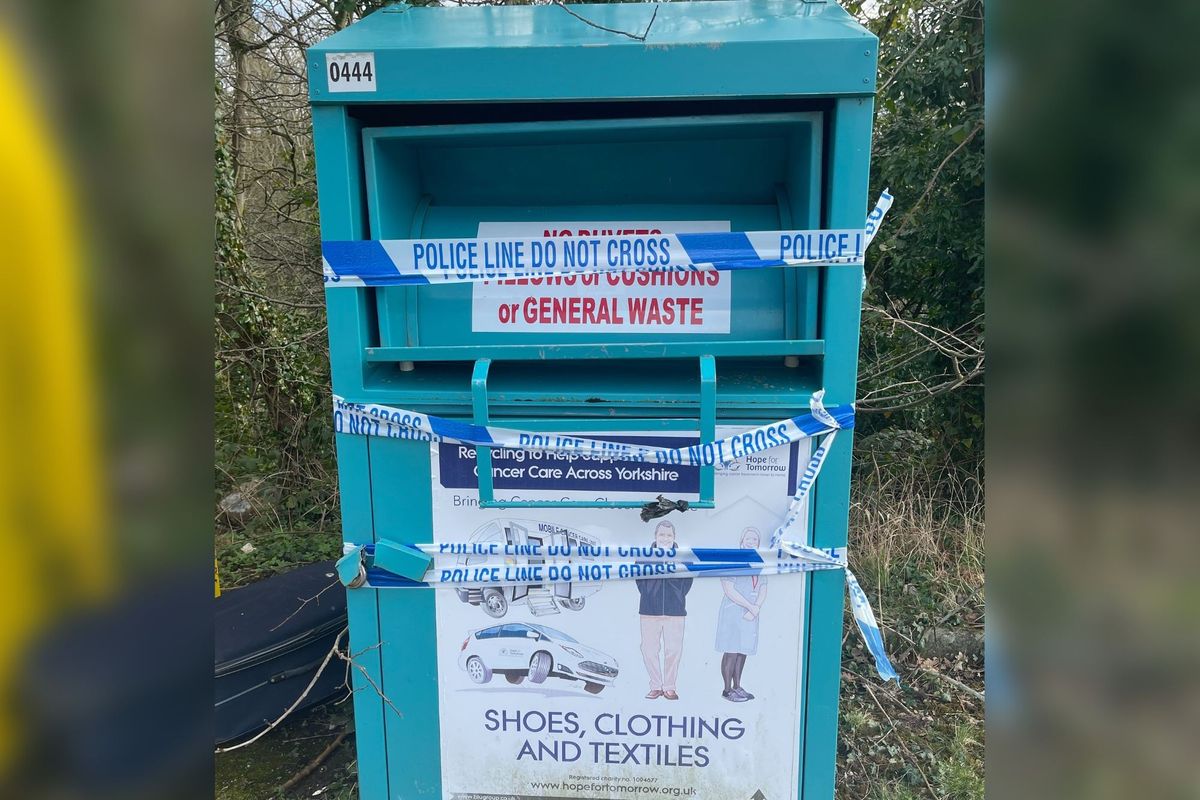 A clothing recycling bin where a body was found