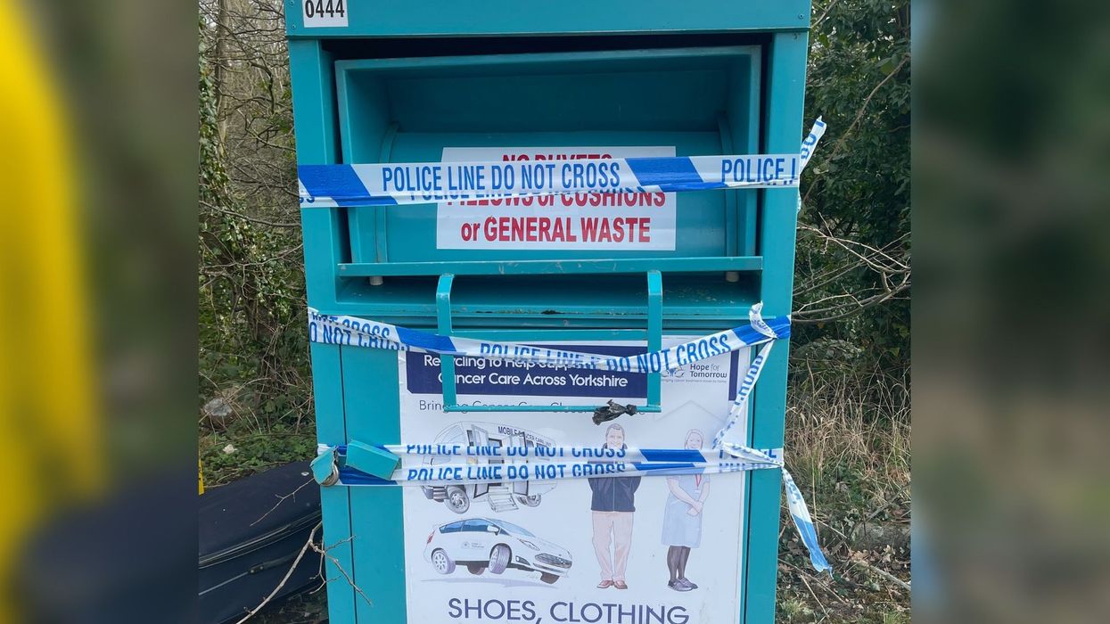 A clothing recycling bin where a body was found