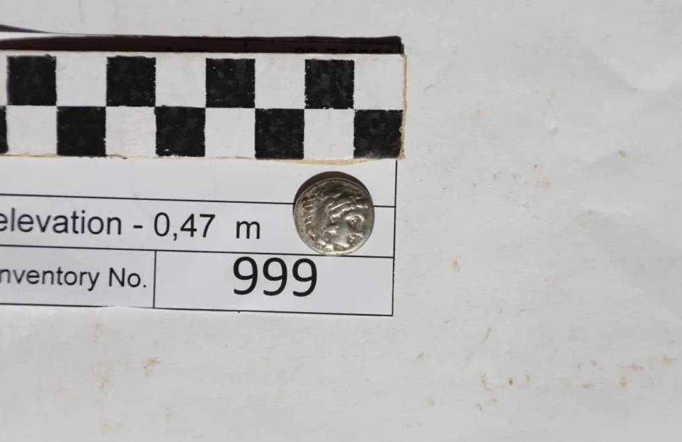 A coin found at the site that was minted while Alexander the Great was still alive