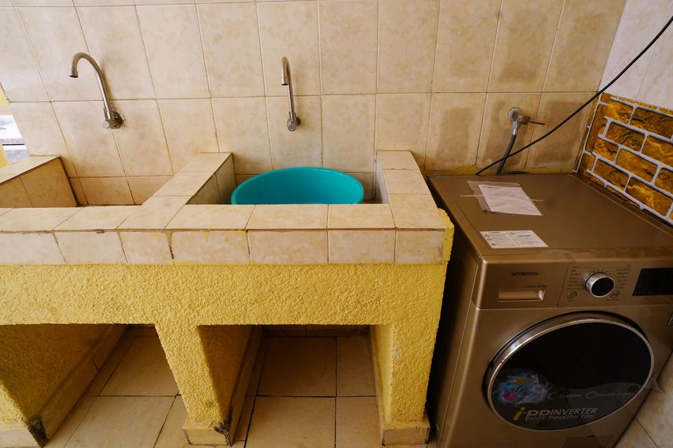 A communal laundry area at the Hope Hostel in Kigali, Rwanda, where migrants will stay after arriving from the UK on a deportation flight