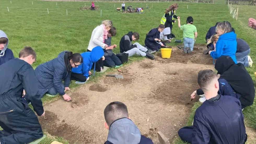 A community excavation earlier this month revealed sections of wall, pottery, bone, slate and a 13th Century coin