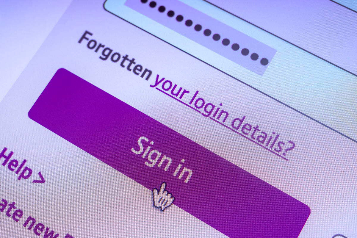 a computer mouse hovers over the sign in button of a password login field on a website