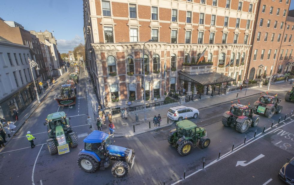 A convoy of farmers passing through Dublin city centre to call on the Government to listen to their concerns on the common agricultural policy and the Climate Action Plan. Picture date: Sunday November 21, 2021.