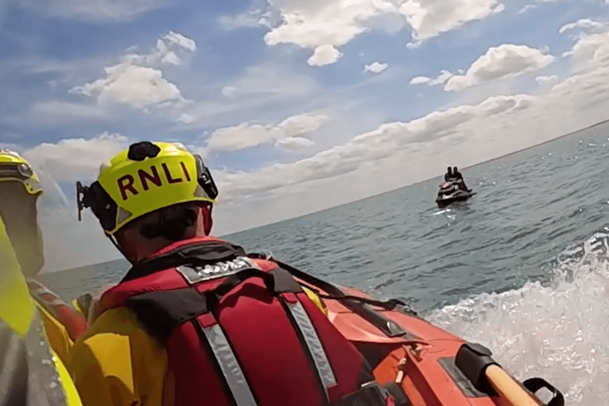A crew rescuing