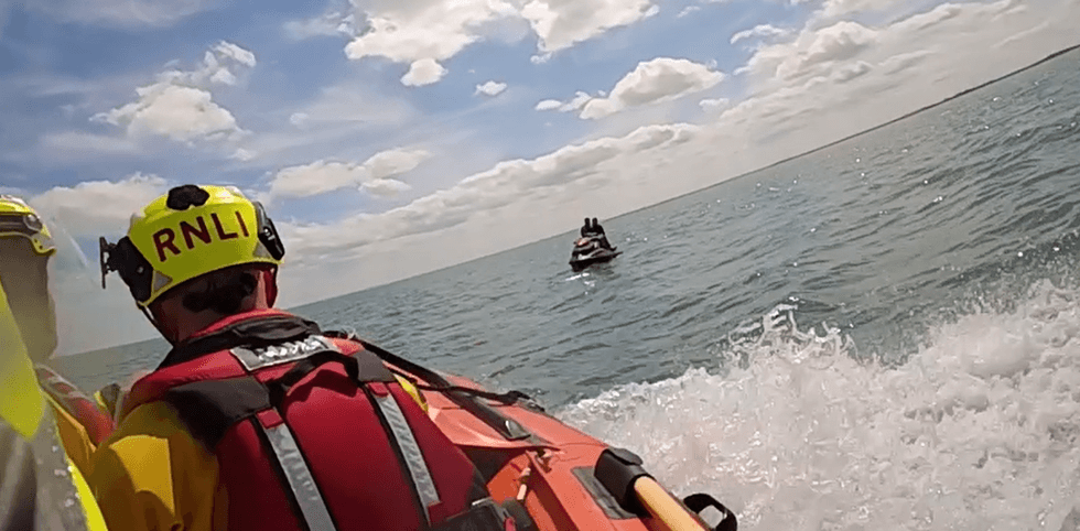 A crew rescuing