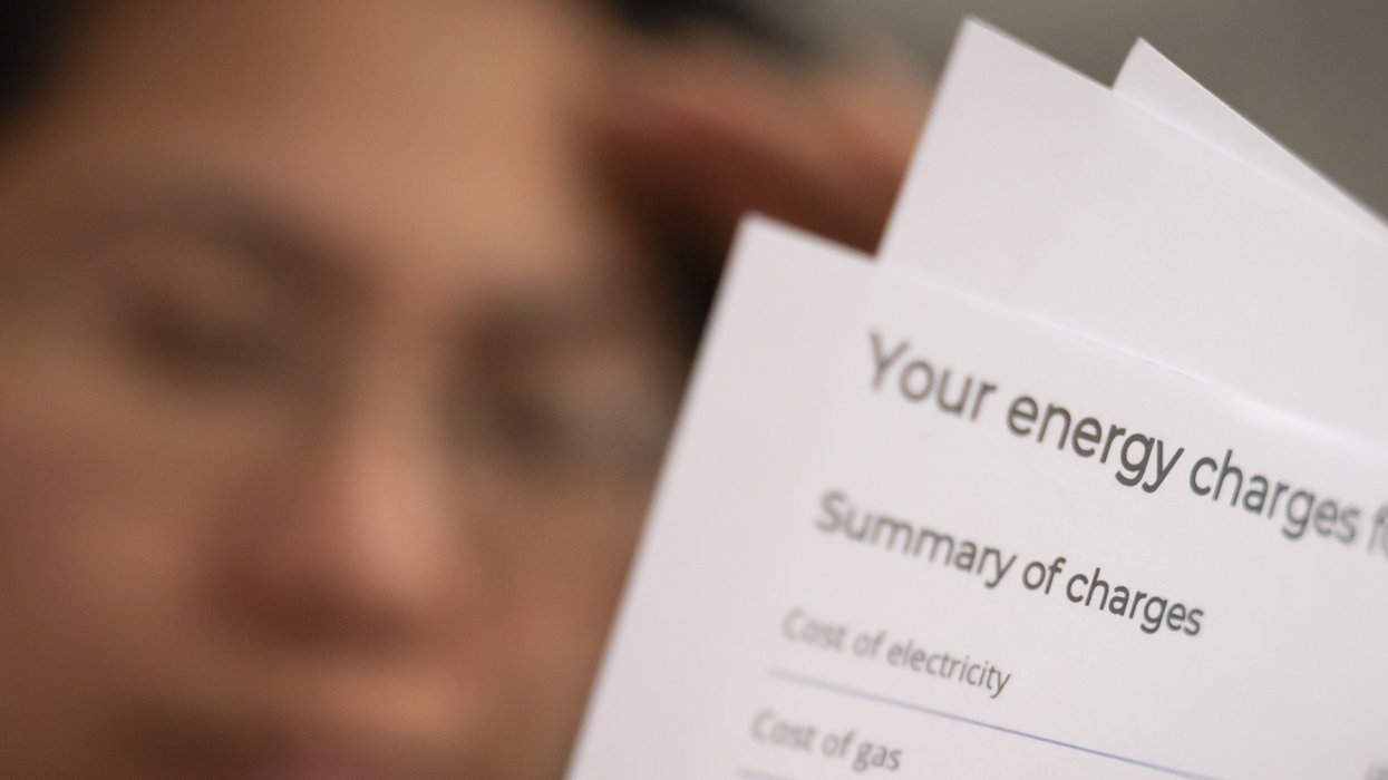 A customer looks at their energy bill