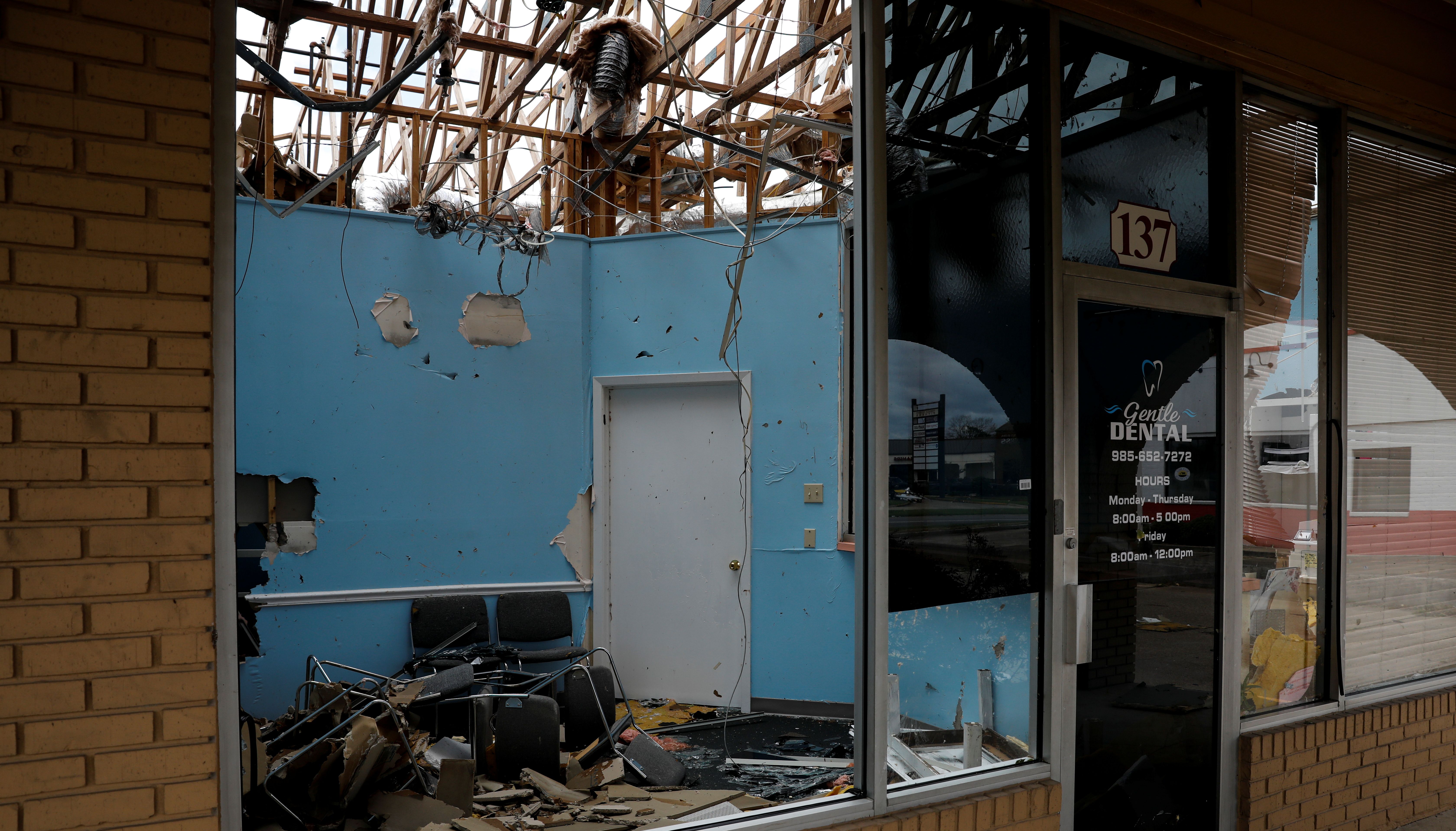 A damaged business is seen after Hurricane Ida made landfall in Louisiana.