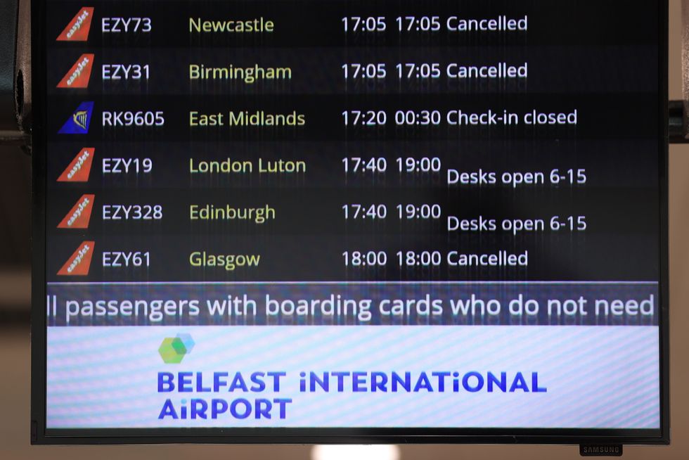 A departure board at Belfast International Airport, as flights to the UK and Ireland have been cancelled as a result of air traffic control issues in the UK